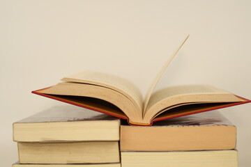 open book on pile of book background shcool study book