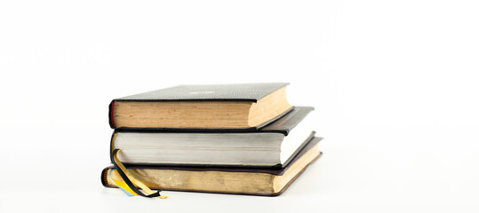 Stack of books on a white background. Isolated