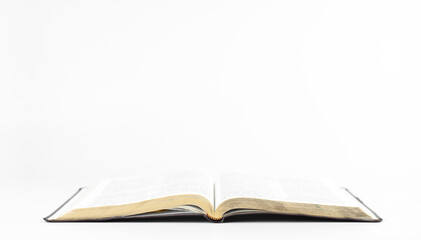 Open book holy bible on a white background. Scripture