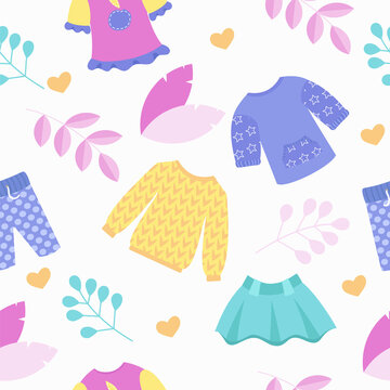 Kid's clothing store. Skirt, jumper and pants in cute colors.