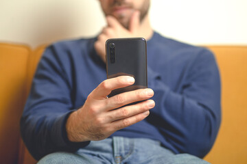 The man videocalling by smartphone the girl. Online dating, virtual meeting, internet dates