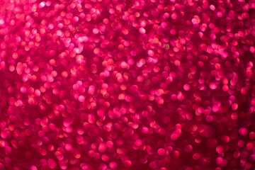 Glitter pink background.  Red and pink background with sparkling festive glitter