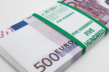 Bundle of euros on a white