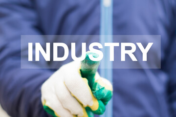 Businessman pressing button industry on virtual screen.