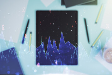 Multi exposure of stats data illustration and modern digital tablet on background, top view, computing and analytics concept