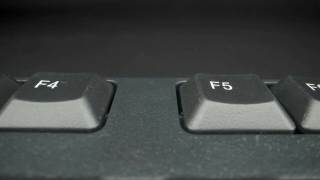 A long press on the F5 button on the top of the keyboard