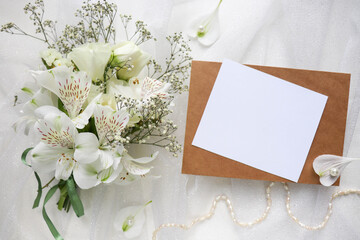 greeting card mockup. small bouquet of white flowers and space for text 