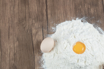 Sweet pie making ingredients on a wooden board