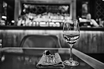 evening in a restaurant, blurred abstract background, bokeh, alcohol concept, wine glasses in a bar