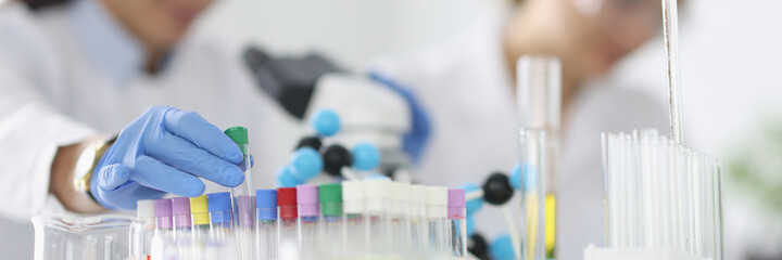 Two researchers are conducting experiments in laboratory. Medical research concept