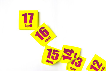 April 17th. Day 17 of month, Calendar date. Many yellow sheet of the calendar. Spring month, day of...