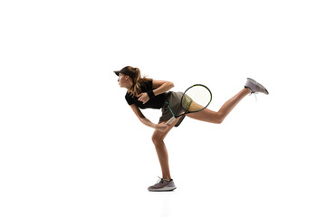 Fit. Young caucasian professional sportswoman playing tennis isolated on white background. Training, practicing in motion, action. Power and energy. Movement, ad, sport, healthy lifestyle concept.