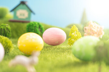 Easter egg outside in grass with evening sun from behind