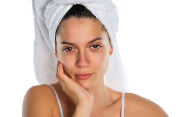 woman posing with a towel on her head