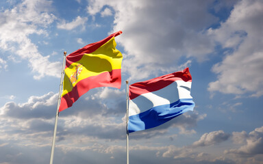 Flags of Netherlands and Spain.