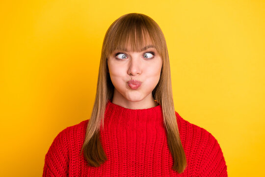 Photo of blond nice optimistic lady hold air crossed eyes wear red sweater isolated on bright yellow color background