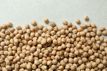 Fresh chickpea on white textured background, space for text