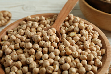 Bowls with spoon and chickpea, close up
