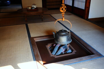 Vintage Japanese Kettle on  Firewood Stove.