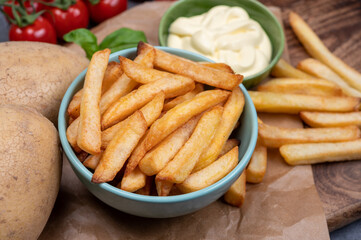 Bown with fresh cooked french fries potato chips with belgian mayonnaise sauce