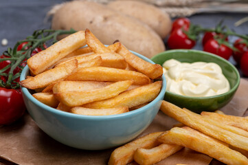 Bown with fresh cooked french fries potato chips with belgian mayonnaise sauce