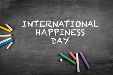 International Day of Happiness 20 March. Gray chalk board background
