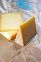 Cheese collection, French comte and Swiss gruyere cheeses