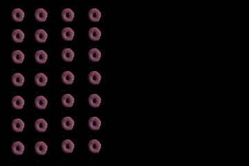 pink donuts over black background