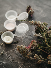 Obraz na płótnie Canvas Spa cosmetics: natural herbal body scrub. Sea salt, composition and ingredients.