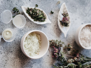 Spa cosmetics: scrub, salt, herbal soap, natural ingredients.