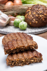 Grilled plant based, meat free vega burgers close up