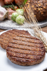 Grilled plant based, meat free vega burgers close up