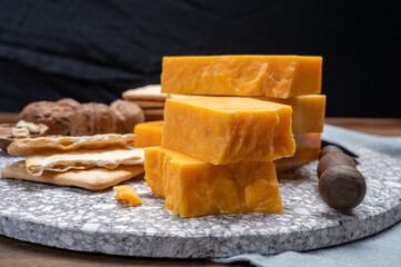Cheese collection, orange and yellow smoked British cheese from England