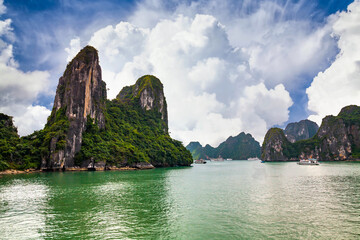 View of ships and islands in Halong Bay at sunset, Vietnam.