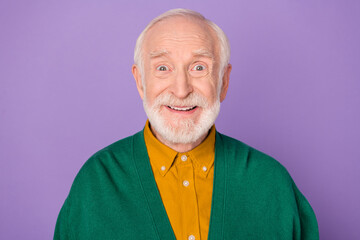 Photo of impressed aged man beaming smile look interested camera isolated on pastel violet color background