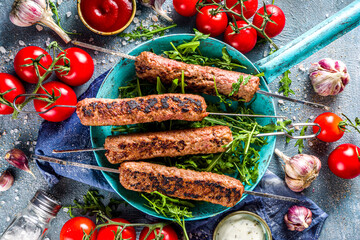 Minced beef kebabs on skewers