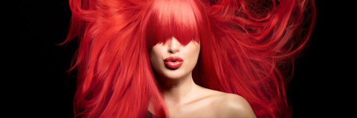 Sensual sexy beauty portrait of a red haired young woman with a healthy shiny long hair