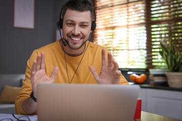 Teacher conducting online lesson at home during COVID-19 quarantine