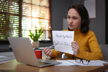 Teacher conducting online lesson at home during COVID-19 quarantine