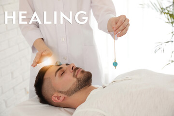 Young man during crystal healing session in therapy room