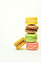 Colorful macarons, sweets, on white background