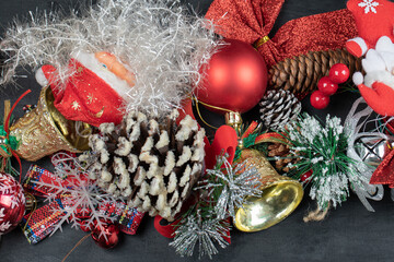 Festive ornaments and figurines on dark background