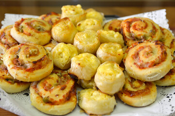 baked mini pizzas with cheese and tomato sauce 