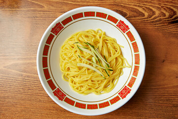 Cucumber garnish on ganjajang noodles