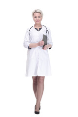 attractive female doctor with clipboard striding forward.