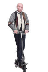 serious mature man with electric scooter. isolated on a white background.