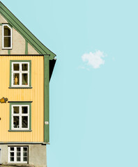 Oslo Wooden House with blue sky.