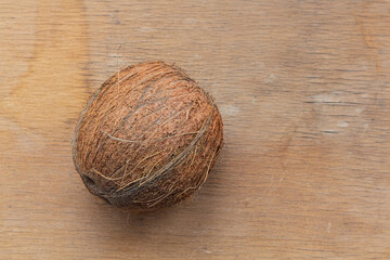 Coconut. Coconut on a wooden background.