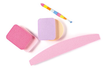 Beauty blender sponge set with nail file and tweezers, makeup tools isolated on white background, top view