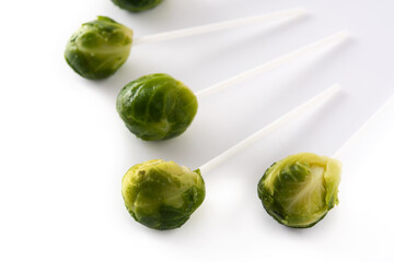 Set of brussel sprouts with lollipop sticks isolated on white background